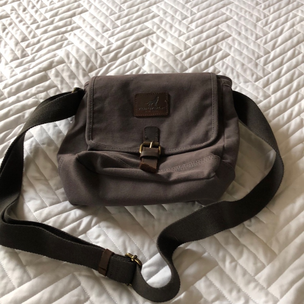 Grey top wolf crossbody bag